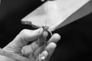 hand making wedding ring
