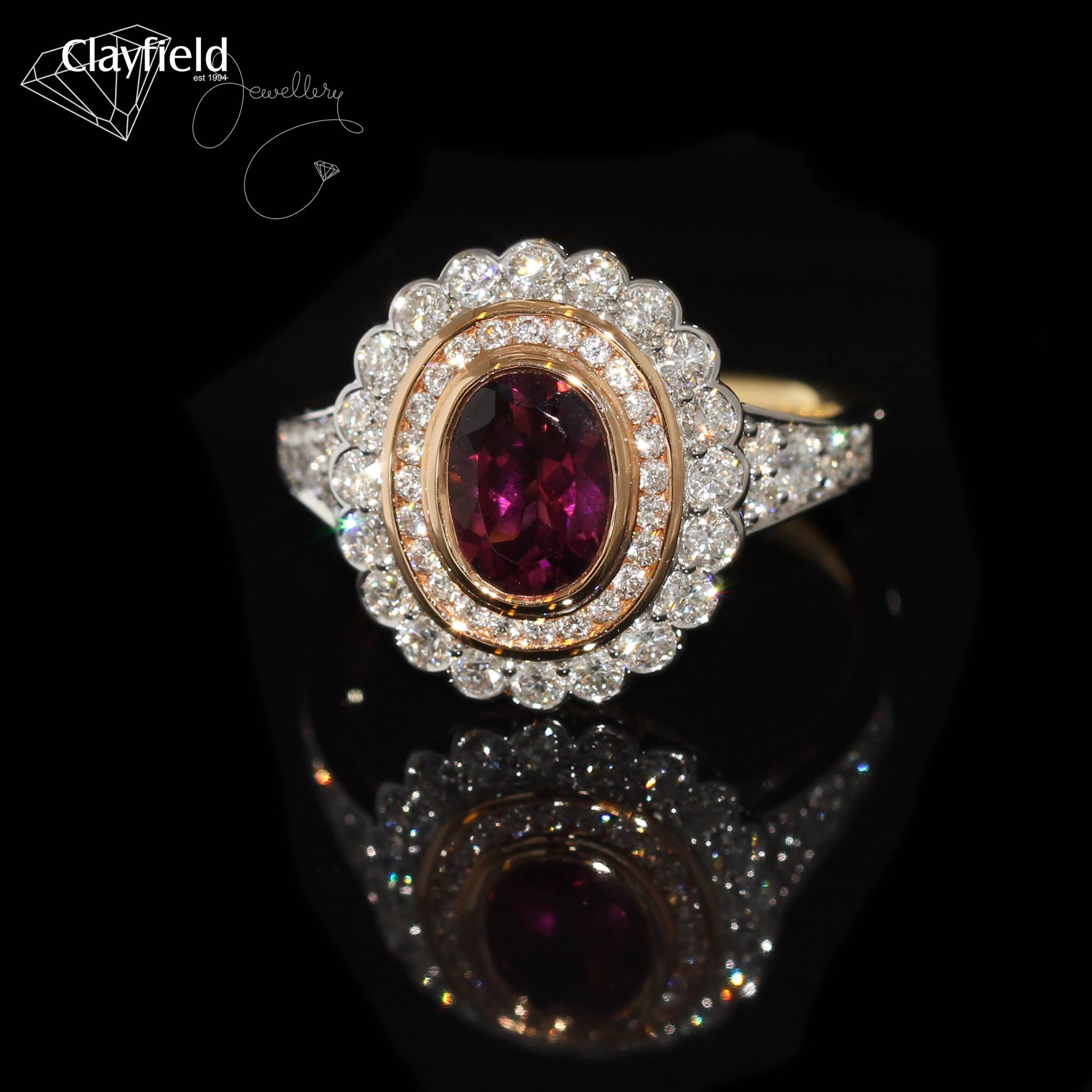 pink diamond ring with diamond halo