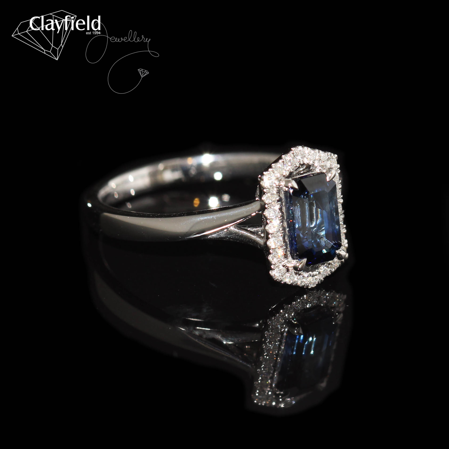 18ct White Gold ring contains a 1.23ct Sapphire & 24 Diamonds